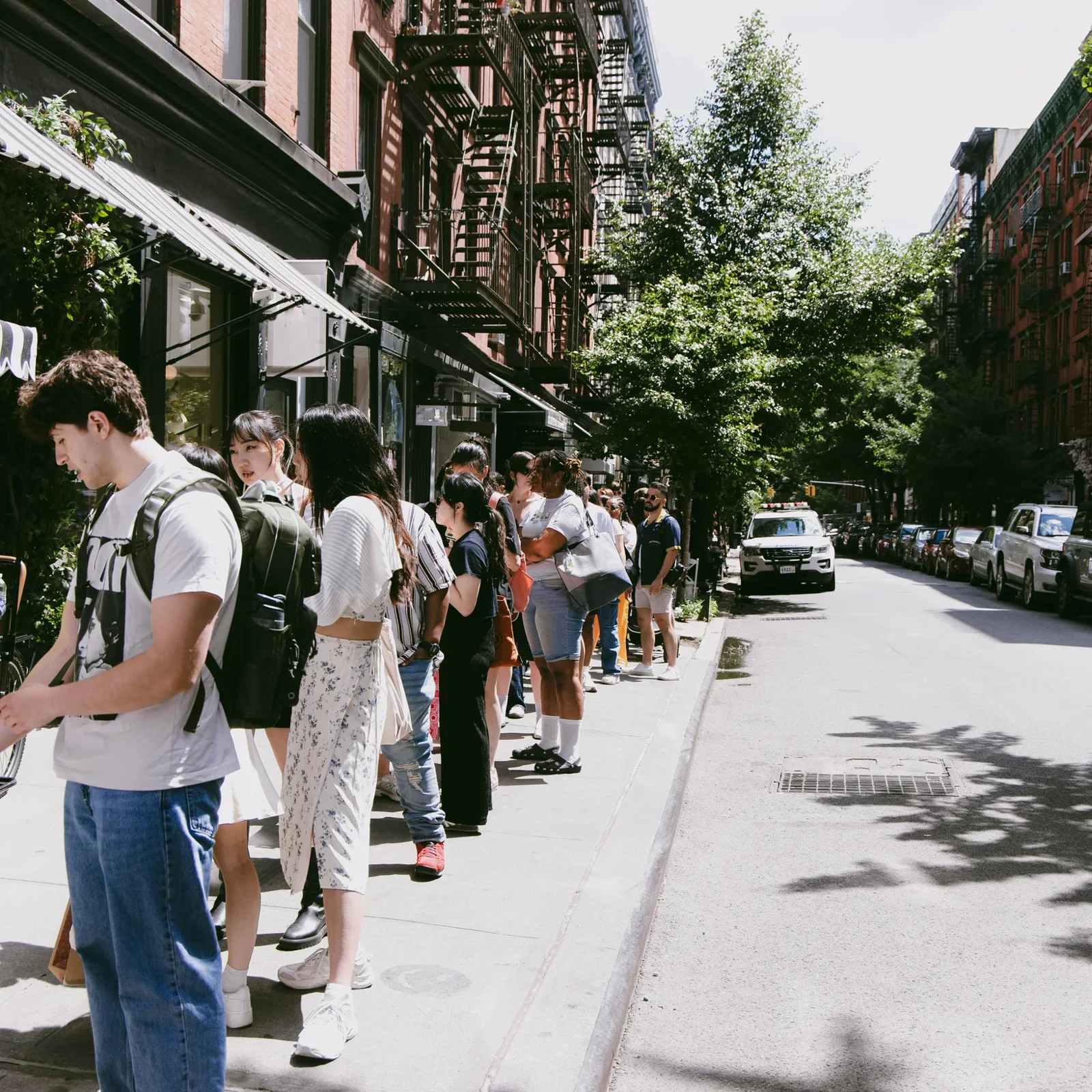 Visitors waiting outside the June 2024 Dossier pop-up.