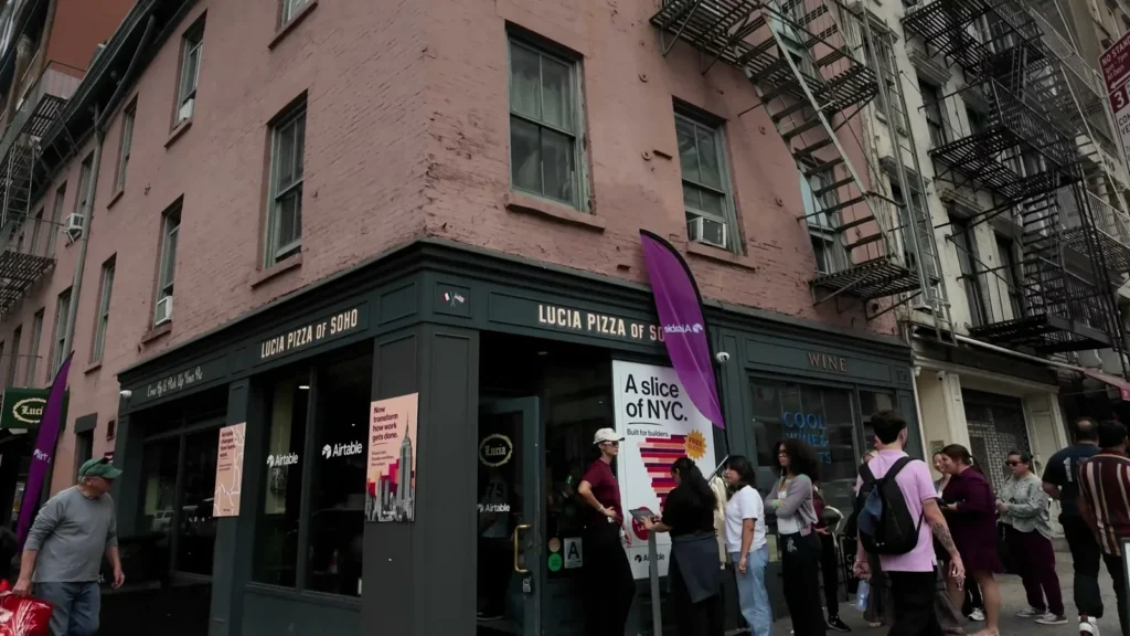Airtable’s A Slice of New York campaign outside Lucia Pizza of SoHo, from the campaign film.