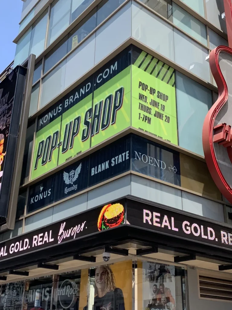 The Konus × Rowdy pop-up’s street-facing identity on Hollywood Boulevard · June 2019.