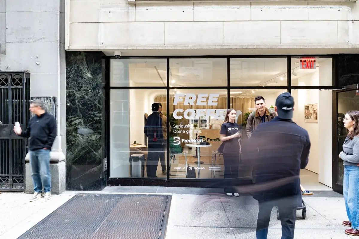 A free-coffee invitation at 15 East 40th Street, Midtown Manhattan.