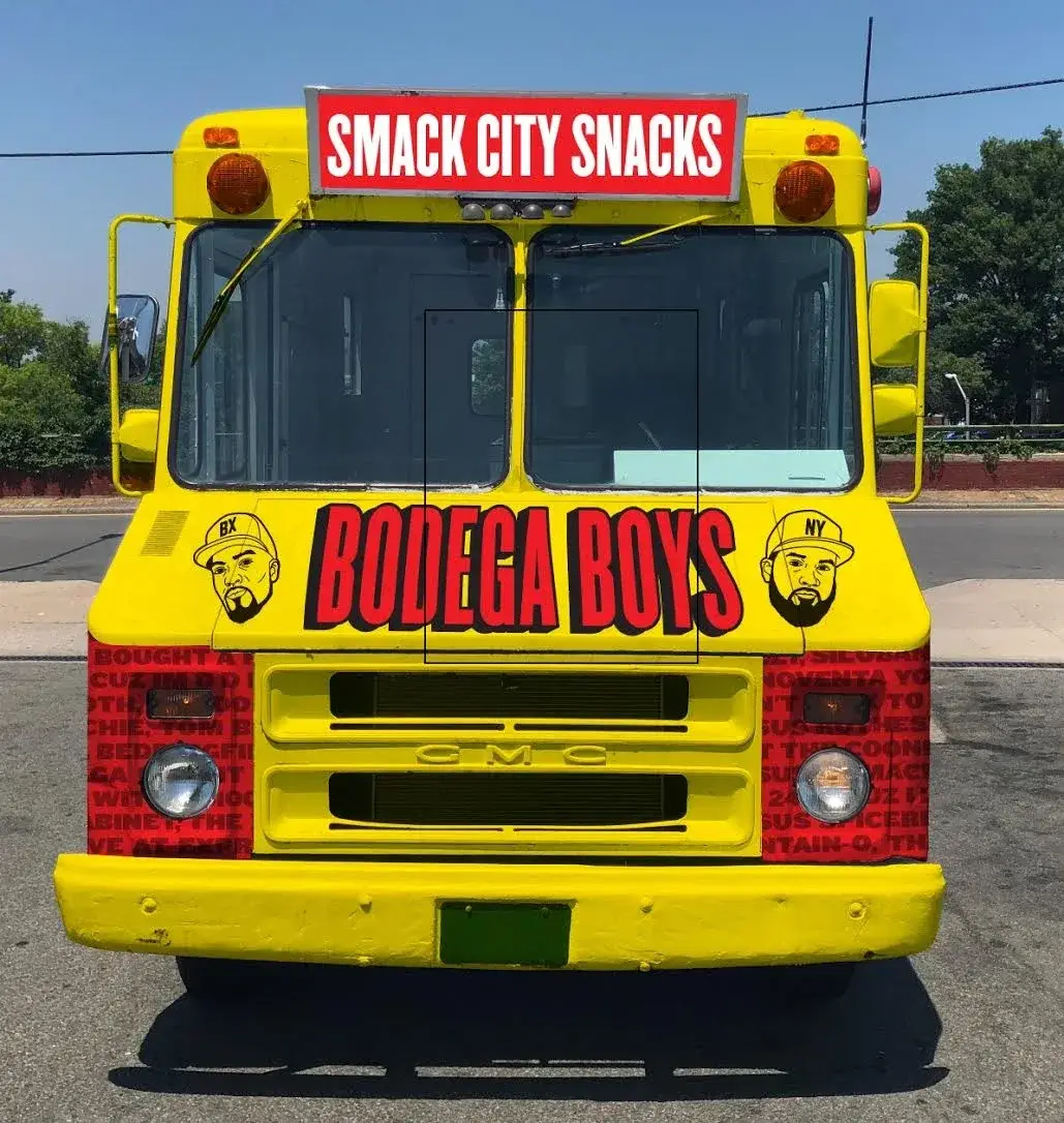 Smack City Snacks and Bodega Boys identity across the front of the vehicle.