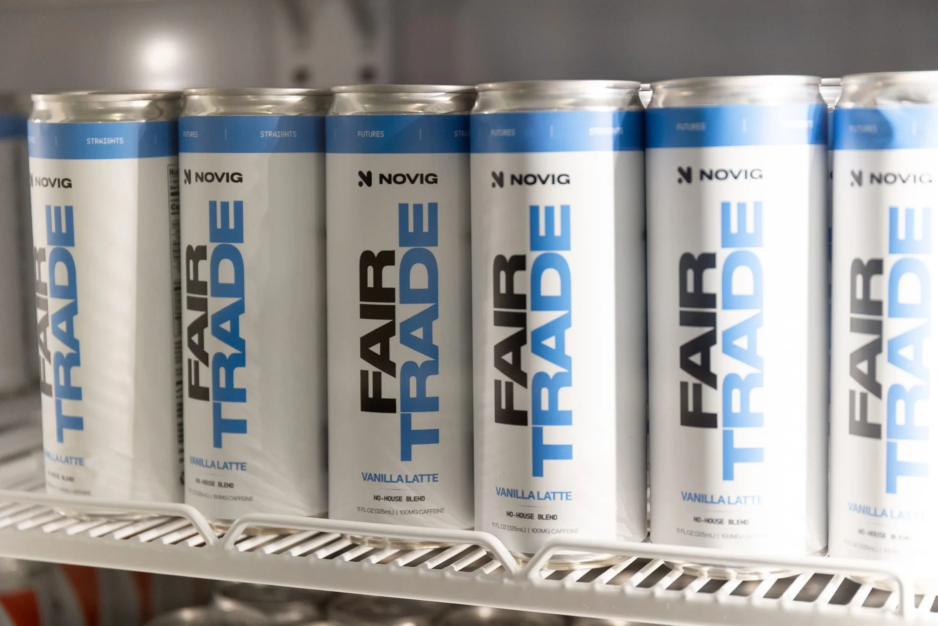 Partner messages appear on FreeBean cans throughout the shop.