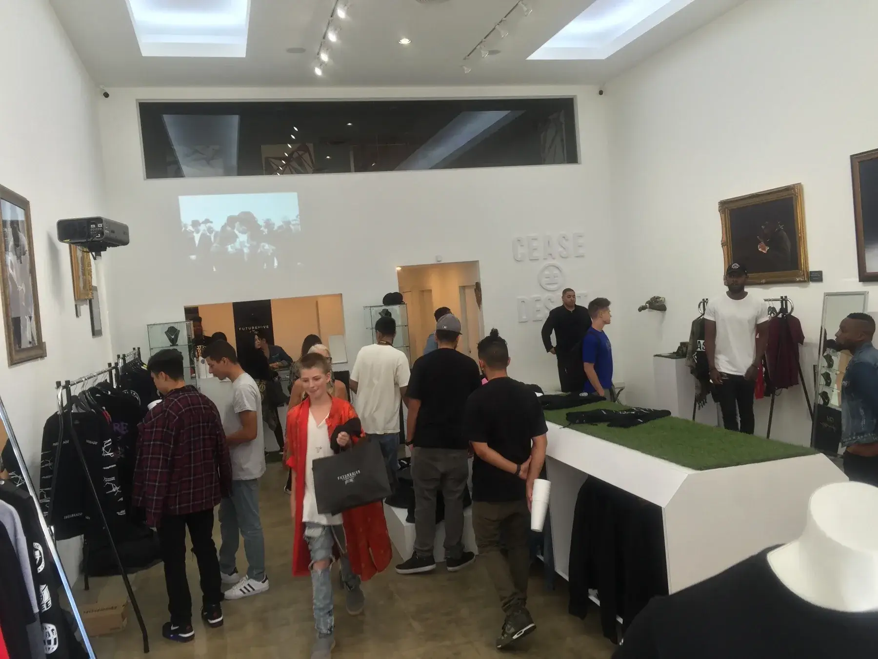The completed Fairfax shop with visitors exploring the collection · September 2016.