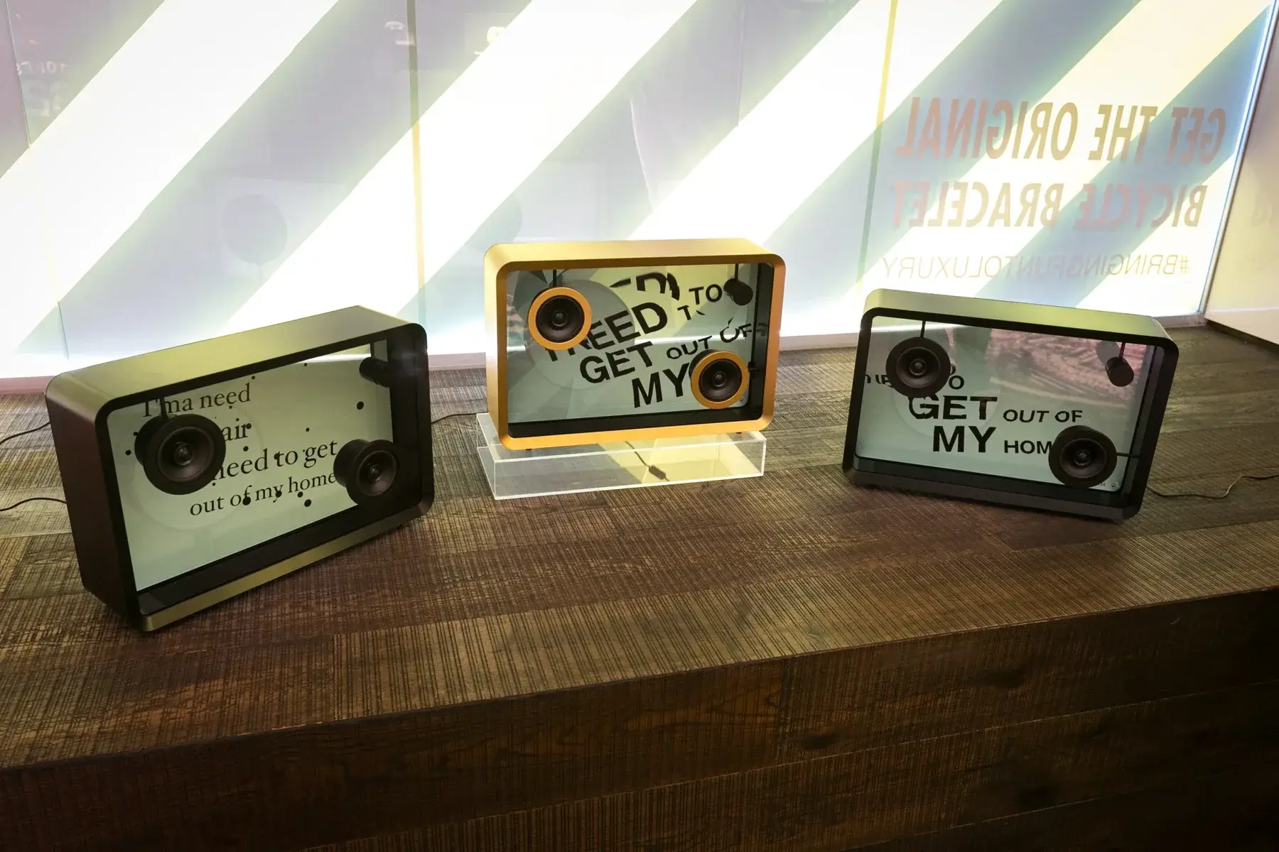Lyric speakers displayed within the artist’s retail environment.